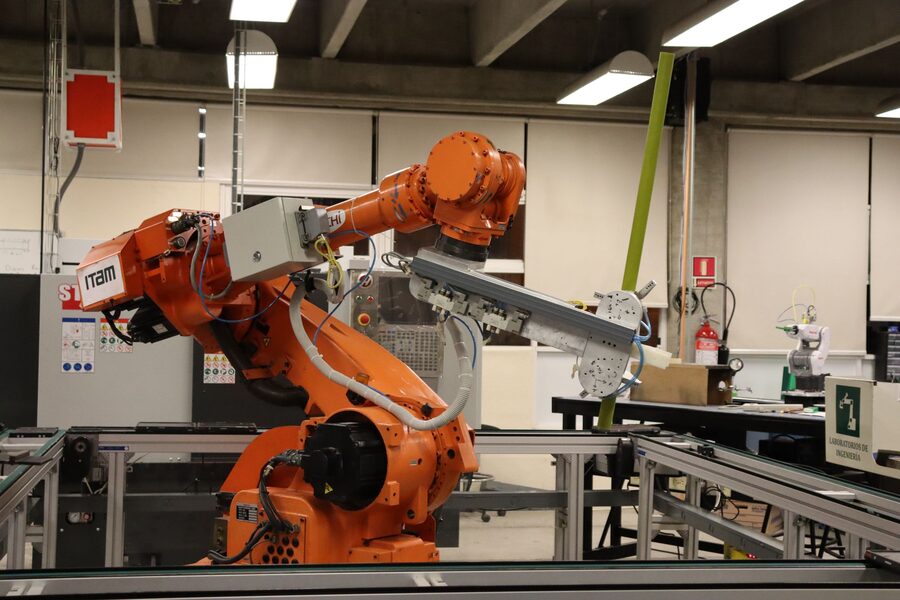 An industrial robot arm on an automated line